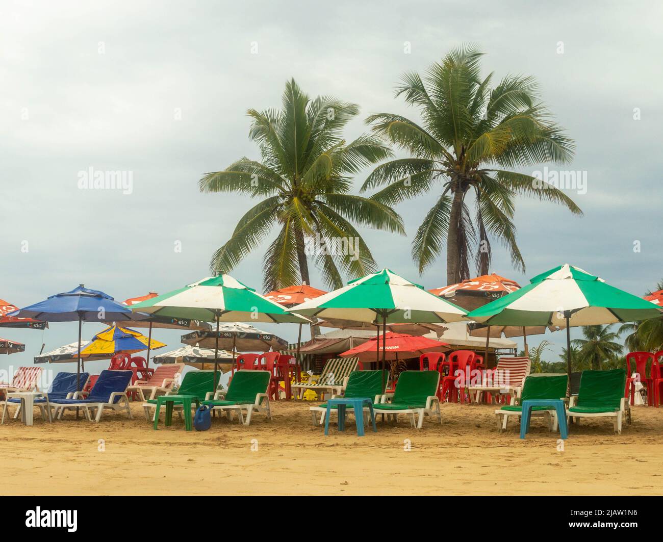 Lansdcape of a beach with umbrellas and deckchairs Stock Photo