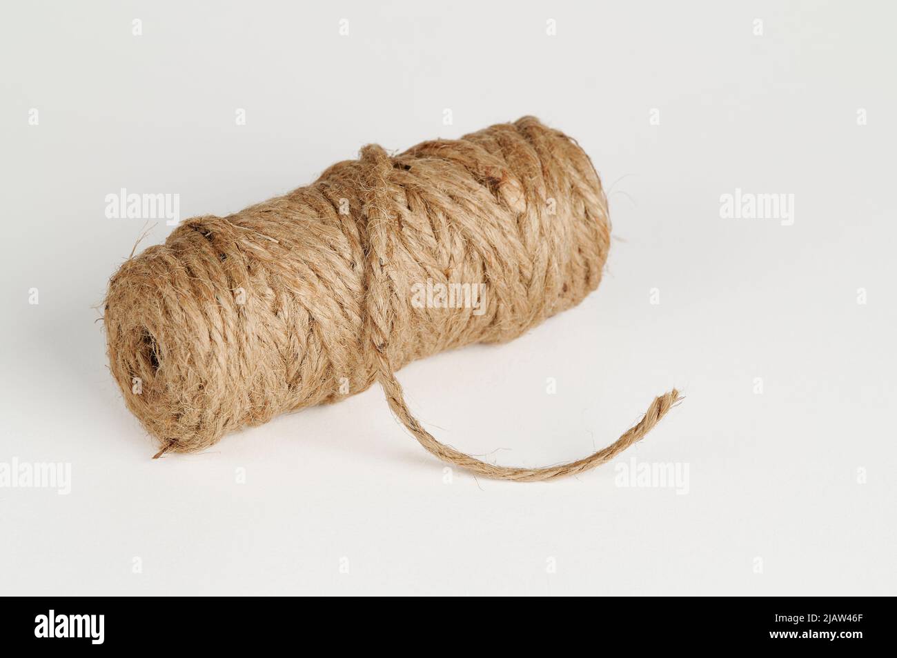 Skein of Jute twine on a white background Stock Photo