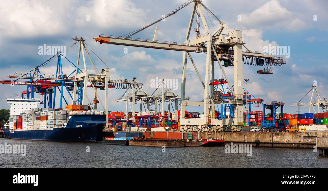 Hamburg, Germany - July 12, 2011 : Docks at Hamburg Harbor. Cargo and shipping industry on south shore of Elbe River. Stock Photo