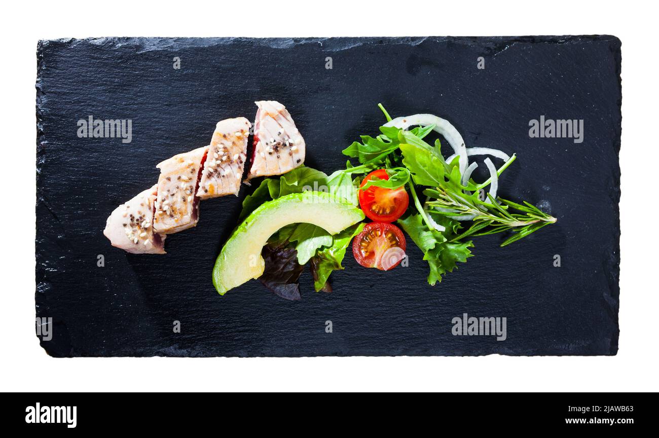 Top view of tuna tataki with avocado and greens Stock Photo Alamy