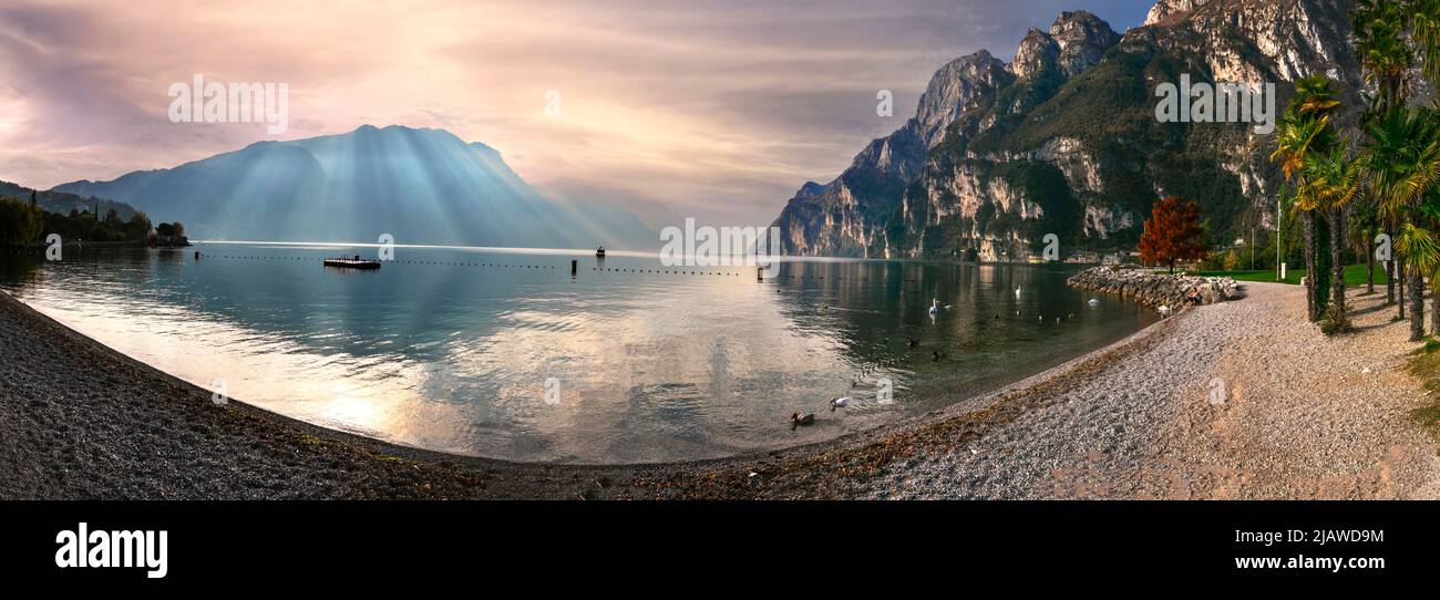 Garda lake. Beautiful morning light in amazing Lago di Garda. Riva del Garda, northern Italy Stock Photo