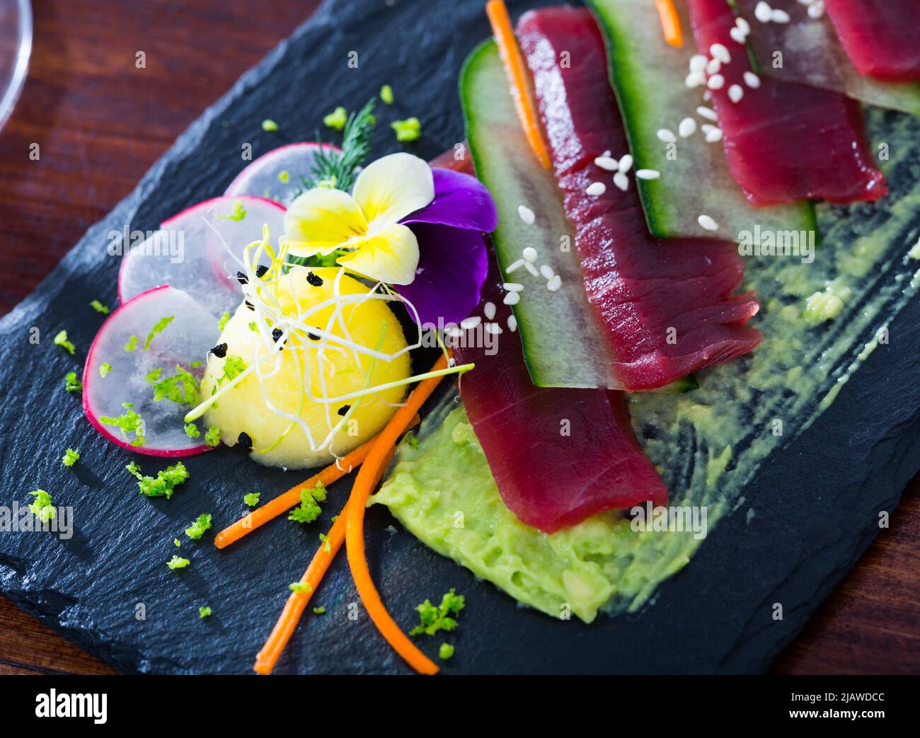 Tuna carpaccio with avocado sauce Stock Photo Alamy
