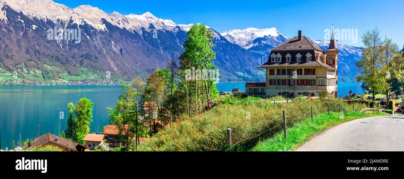 Stunning idylic nature scenery of lake Brienz with turquoise waters. Switzerland, Bern canton. Iseltwald village Stock Photo