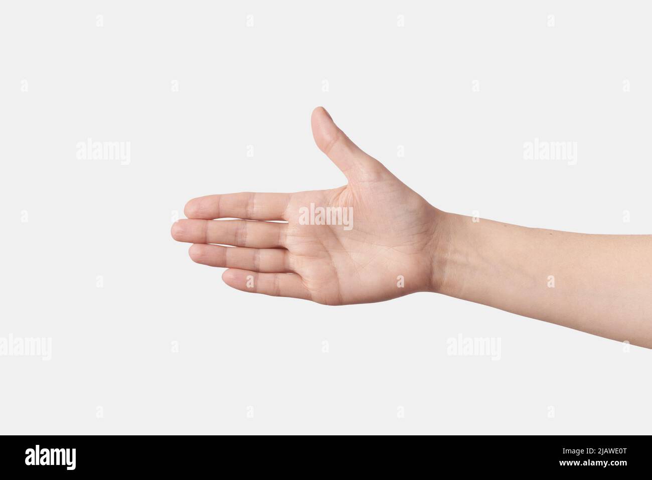 Female wide open wrist, hand reaching for a handshake with a thumb up