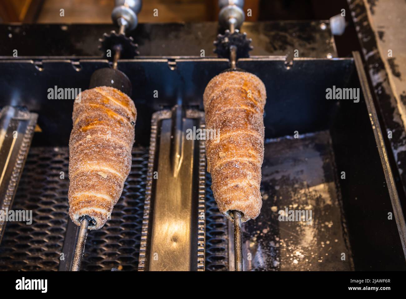 Close up sweet Trdelnik baking on grill, this spit cake is popular in  Europe, Austria, Hungary, Slovakia and Czech, especially in Prague Stock  Photo - Alamy