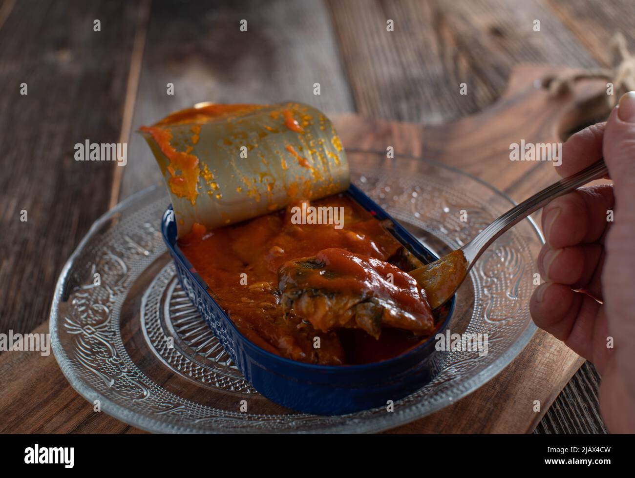 Herring in tomato sauce in a can Stock Photo Alamy