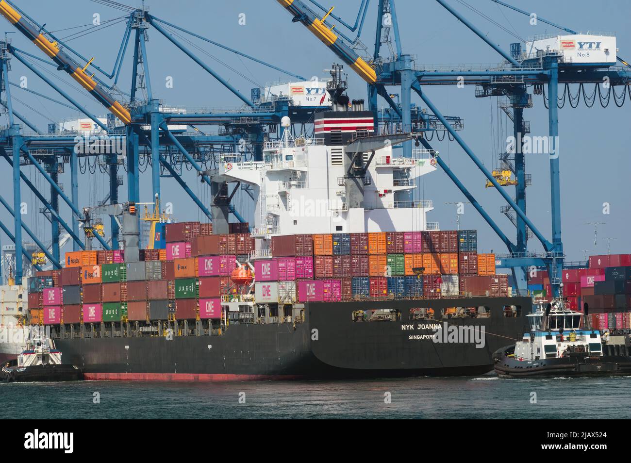 Container ship NYK Joanna shown arriving on a sunny day with blue sky. Stock Photo