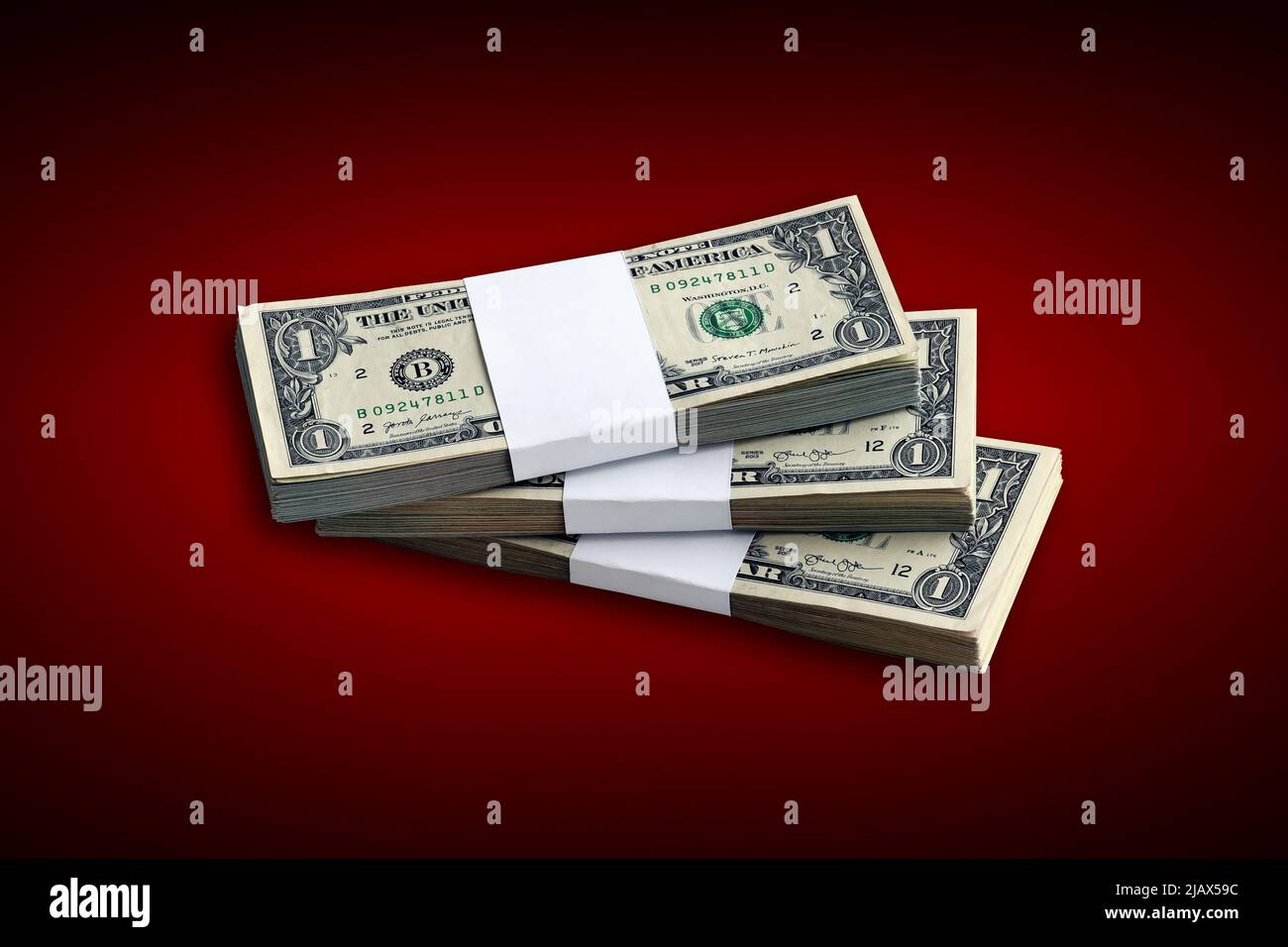 Bundle of US dollar bills on crimson red background. Pack of american ...