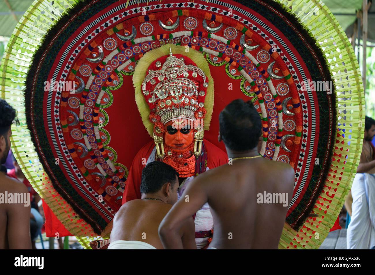 Theyyam is a famous ritual art form in kerala with face painted using