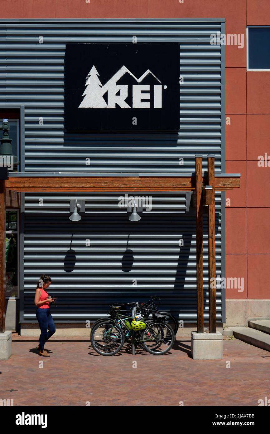 A customer exits an REI (Recreational Equipment, Inc.) store in Santa