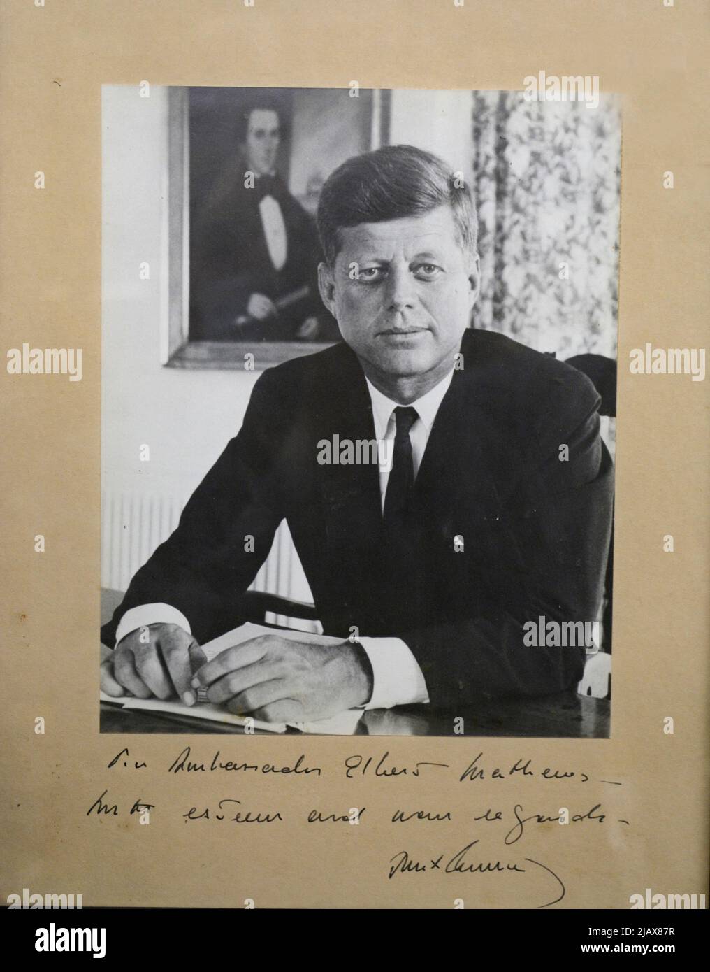 An inscribed and autographed photograph of former U.S. President John F