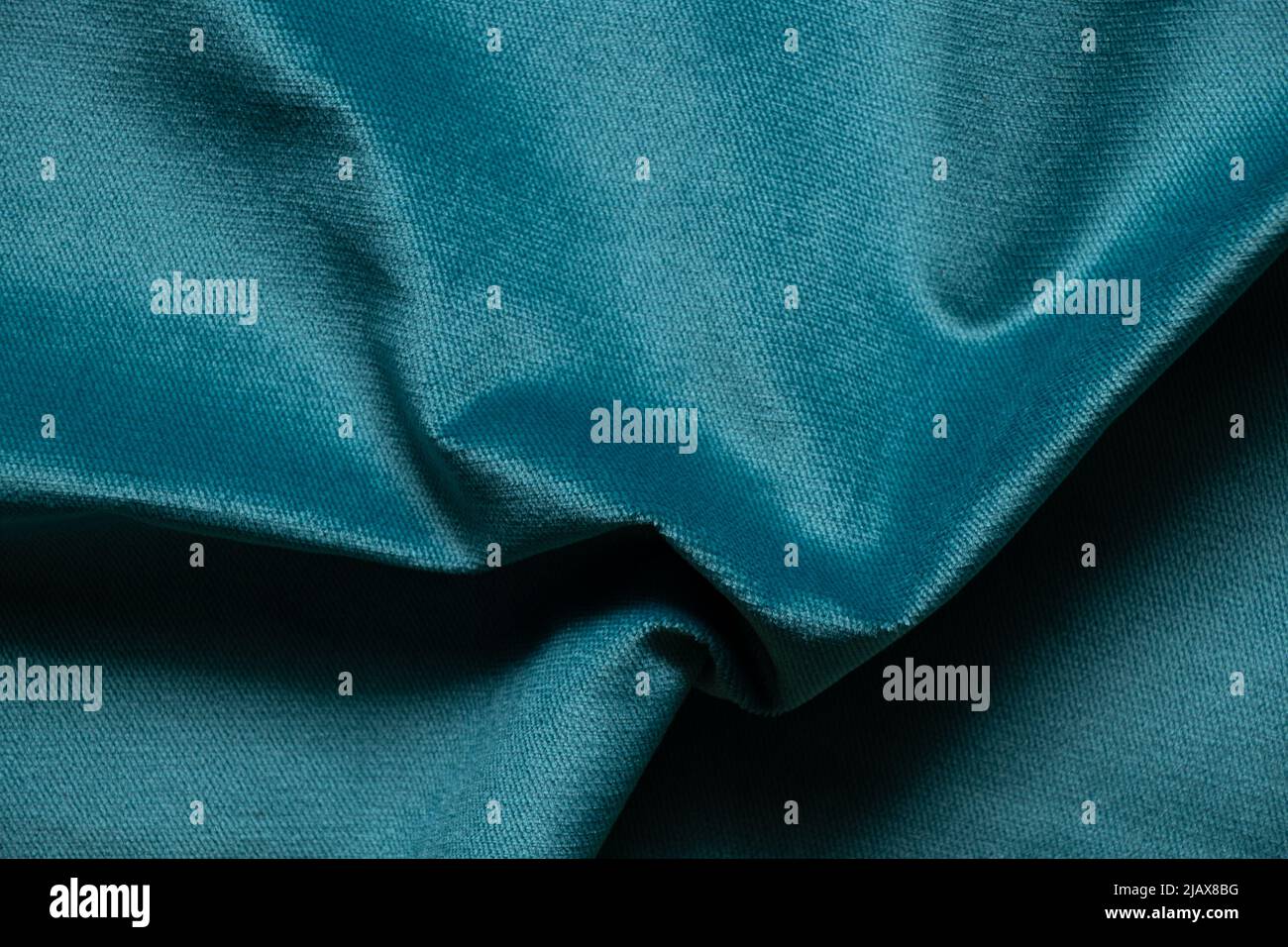 Soft velor blue fabric as a background, backgrounds and texture, trendy blue color in support of Ukraine Stock Photo
