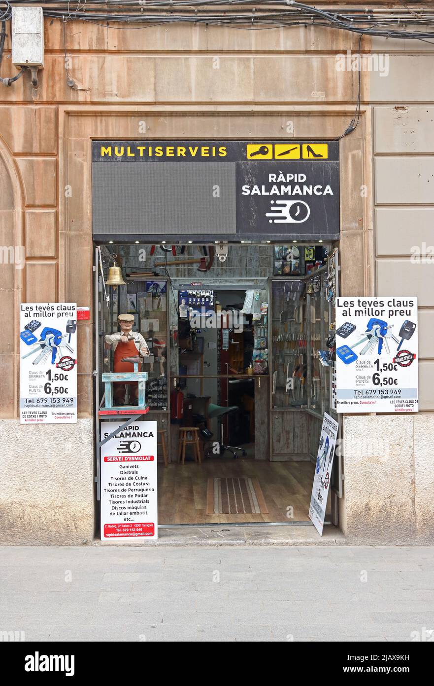 Shop offering shoe repairs and key cutting service, Tarragona Stock Photo