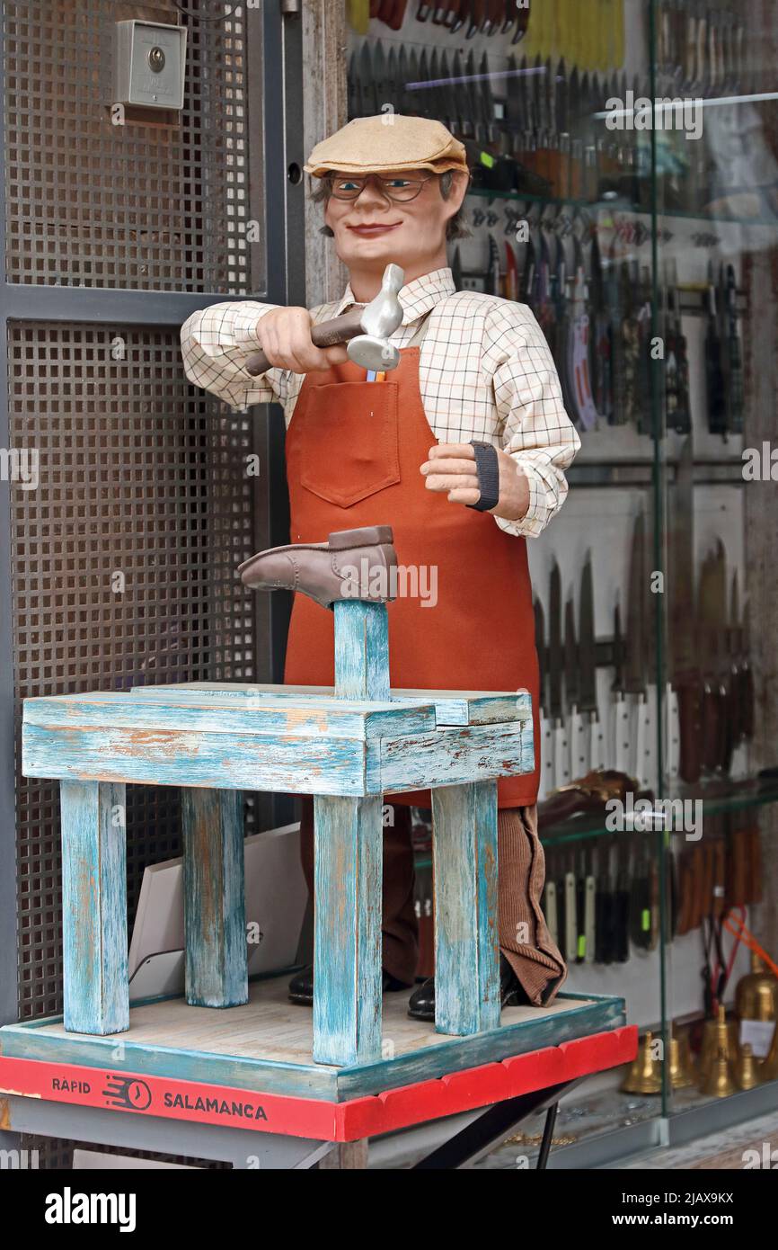 Model of cobbler in shoe repair shop, Tarragona, Stock Photo