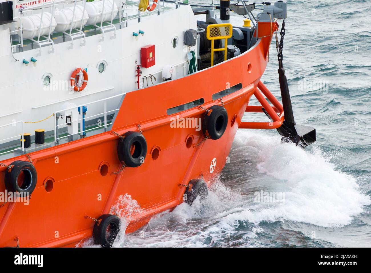 Oil rigs with supply boat boat for transporting people or materials to