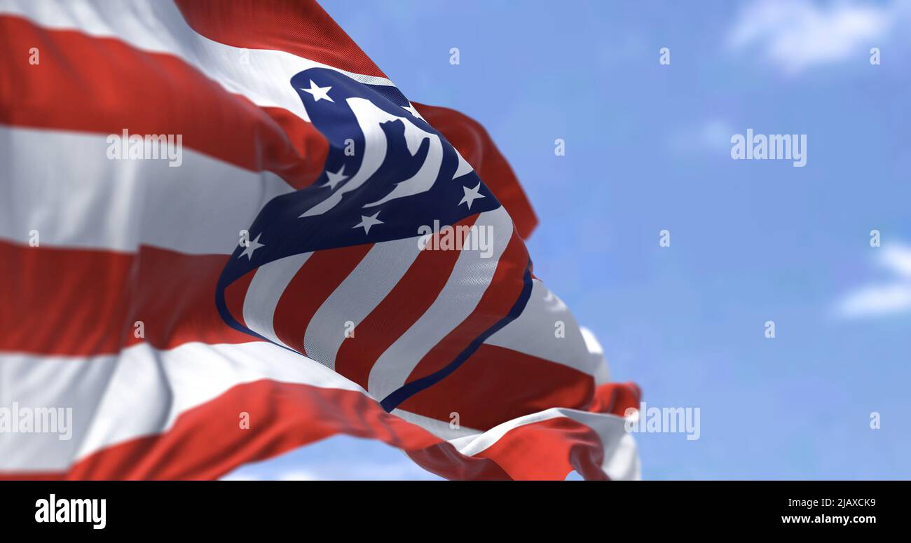 Madrid, Spain, May 2022: The flag of Atletico Madrid waving in the wind on a clear day. Atletico Madrid is a Spanish professional football club based Stock Photo