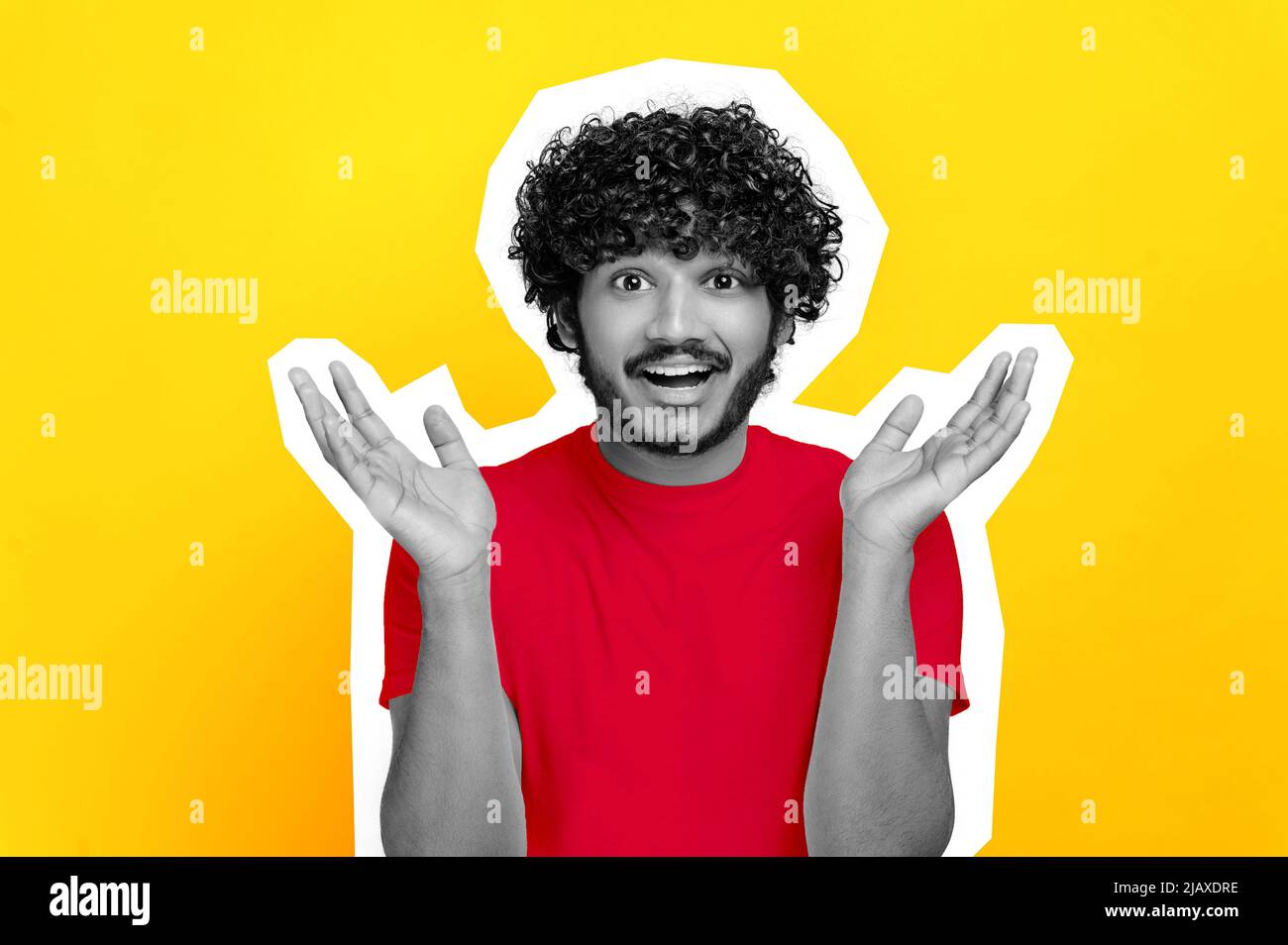 Surprised stunned black and white indian or arabian curly guy, in red t-shirt, looking at camera in disbelief, spreading his arms to the sides, shrugging, stand on isolated orange background. Cut out Stock Photo