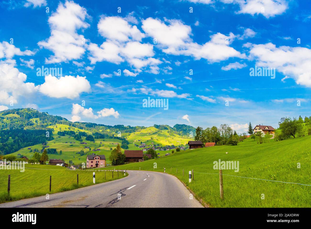 Countryside road in village, Alt Sankt Johann, Sankt Gallen, Swi Stock Photo