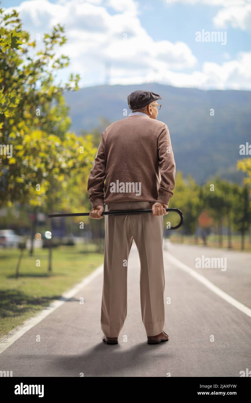 Elderly people alone outdoors hi-res stock photography and images - Alamy