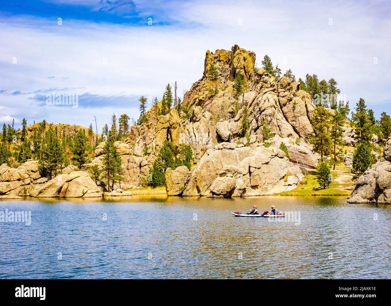 Couple in canoe in Sylvan Lake in Custer State Park in the Black Hills