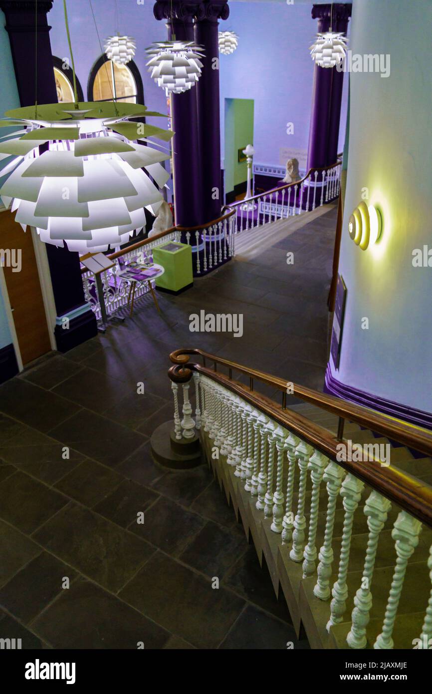 Leeds Art Gallery entrance with white spindles down the staircase and artichoke lamps, West Yorkshire, England, UK. Stock Photo