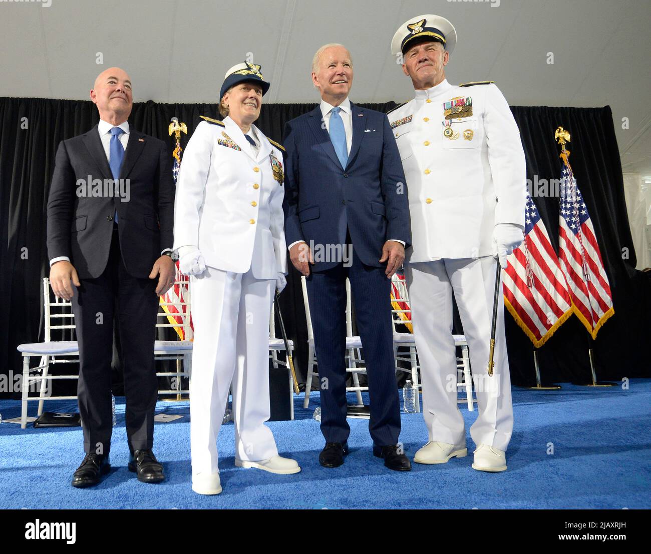 Washington, United States. 01st June, 2022. President Joe Biden (2nd R) and Homeland Security Secretary Alejandro Mayorkas (L) participate in a change of command ceremony with outgoing Commandant Adm. Karl L. Schultz and incoming Commandant Adm. Linda Fagan at U.S. Coast Guard Headquarters in Washington, DC on Wednesday, June 1, 2022. Photo by Bonnie Cash/Pool/Sipa USA Credit: Sipa USA/Alamy Live News Stock Photo