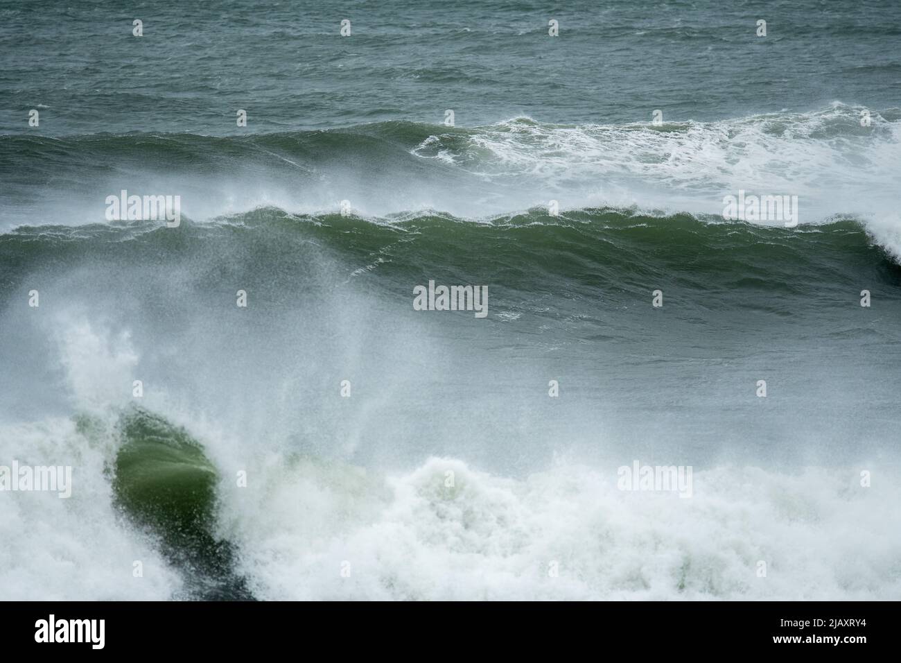 Stock photos of tropical storm Henri in 2021, Newport, RI. Stock photos of hurricane. Stock photos of extreme weather. Breaking Waves, Crashing Waves. Stock Photo