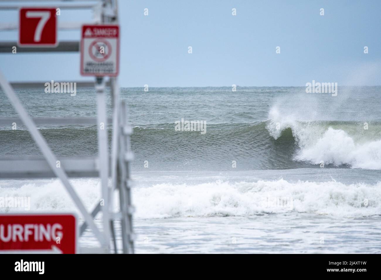 Stock photos of tropical storm Henri in 2021, Newport, RI. Stock photos of hurricane. Stock photos of extreme weather. Empty life guard chair, beach c Stock Photo