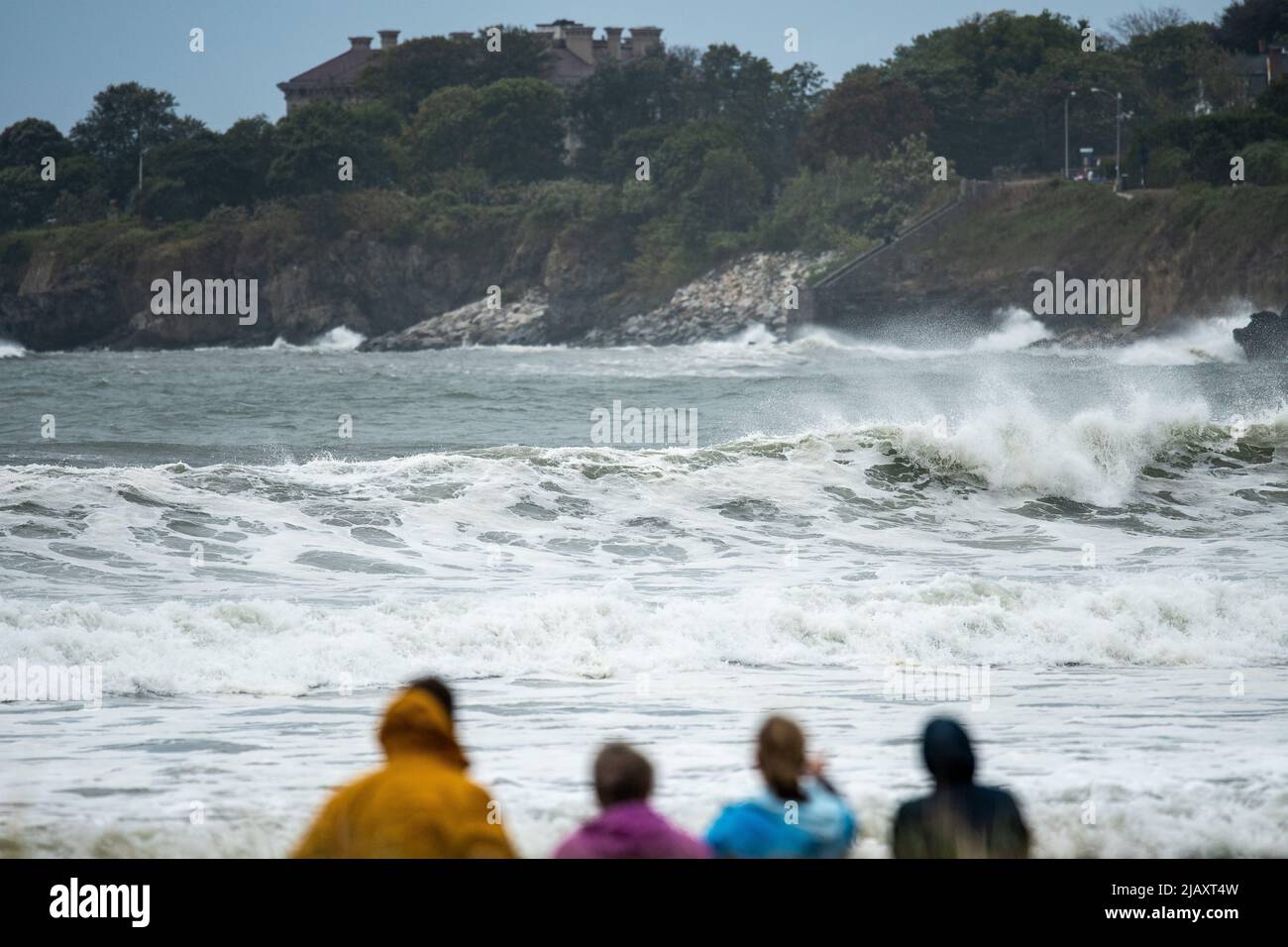 Stock photos of tropical storm Henri in 2021, Newport, RI. Stock photos of hurricane. Stock photos of extreme weather. Family at beach in a storm. Stock Photo