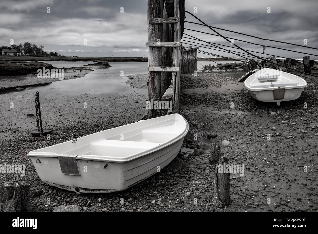 Low tide is the best time to go and enjoy this area round Wharf Landing, and the history around it. Stock Photo