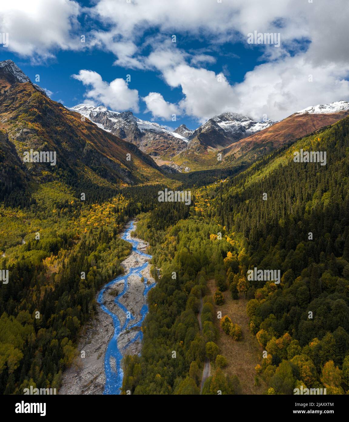 drone view of a beautiful flowing mountain river with a view of the mountain Stock Photo