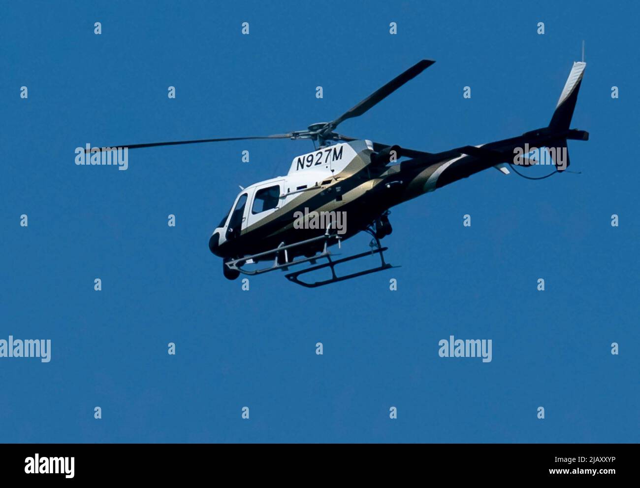 A commercial helicopter overhead Stock Photo