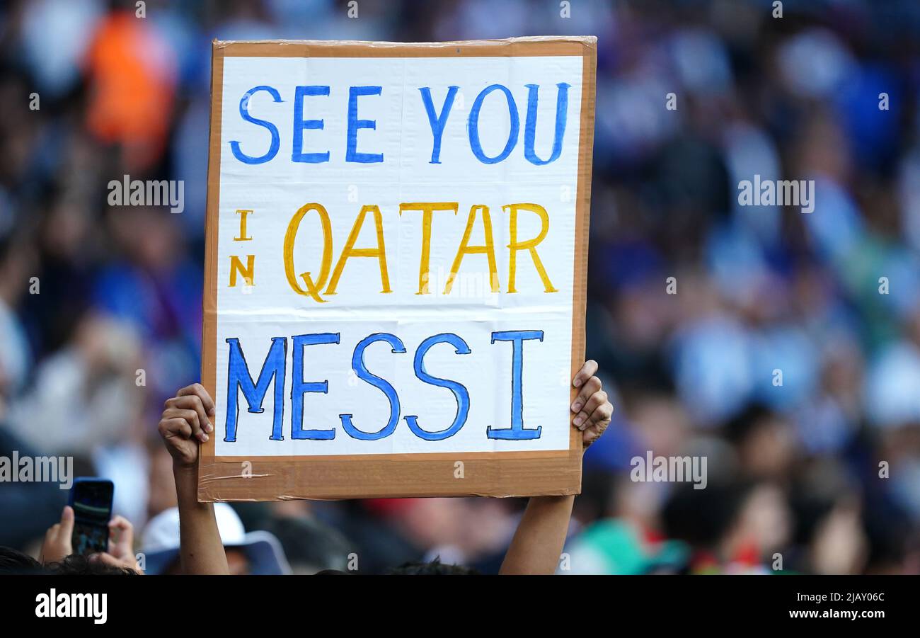 Argentina fans in the stands hold up a sign fro Lionel Messi prior to ...