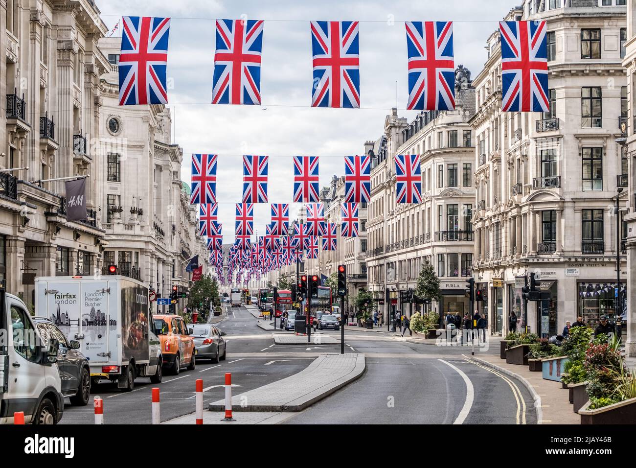 Union Jack flags hang in Regent street, London for the Queen's Platinum Jubilee 2022. Stock Photo