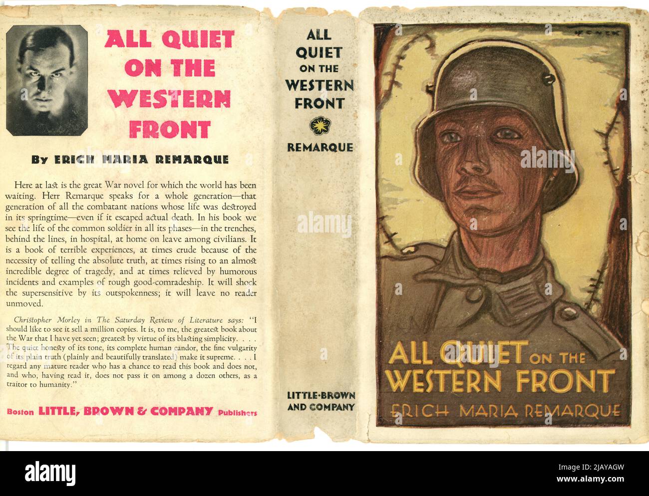Original tattered book cover of All /dust jacket - entitled All Quiet on the Western Front by Eric Maria Remarque, illustrated by Jacket design featuring a German soldier by Paul Wenck. German troops troop. This American edition was published in 1929 Stock Photo