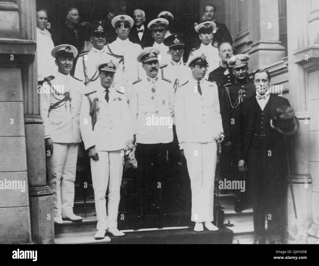 Prince of Wales's Tour in South America: The Prince of Wales and Prince George between whom is President Uriburu on the steps of the British Embassy in Buenos Aires. The British Ambassador, Sir Ronald Macleay, is seen bareheaded behind Prince George's shoulder. May 14, 1932. Stock Photo