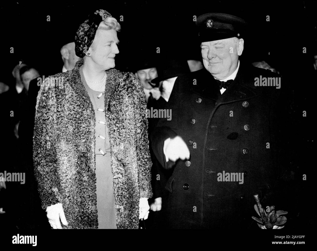 Mr. Churchill's Return : Mr. and Mrs. Churchill arriving. The Prime Minister returned to London to-day following his illness in the Middle East. January 01, 1944. (Photo by Photo News Agencies Ltd.) Stock Photo