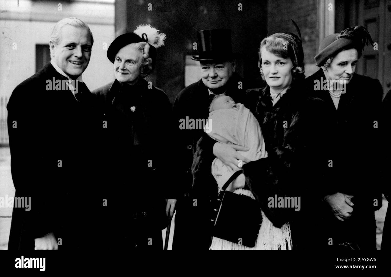 Mr. Churchill At Christening Of His Seventh Grandchild : Left to Right - Mr. Randolph Churchill, Mrs. Winston Churchill, Mr. Winston Churchill and Mrs. Randolph Churchill, holding Arabella after the christening to-day. Mr. Winston Churchill's seventh grandchild - Arabella, born on October 30 to Mr. and Mrs. Randolph Churchill was christened to-day (Thursday) at St. Peter's Church, Eaton Square, London. Mrs. Randolph Churchill was Formerly Miss June Osborne. She was married to the son of the wartime Prime Minister in November 1948. December 08, 1949. Stock Photo