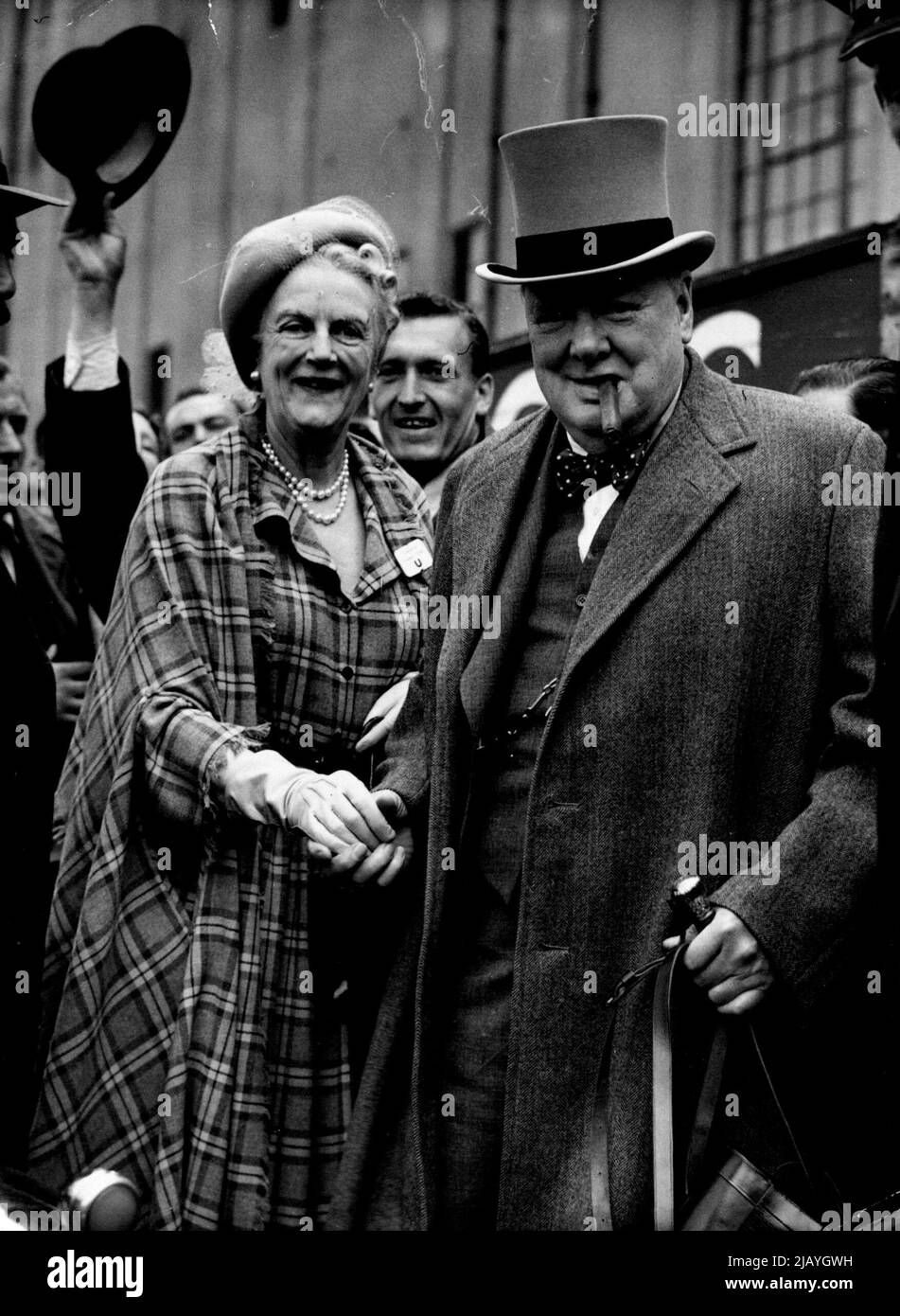 Backing Conservative? Mr. and Mrs. Winston Churchill arrive at Epsom for the Derby today, June 4, Obvious bet for Britain's Tory Leader was Conservative. June 15, 1949. (Photo by Associated Press Photo). Stock Photo