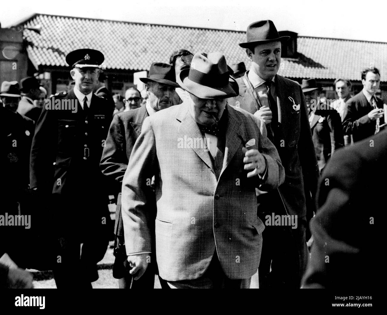 Churchill At The Races: Mr. Winston Churchill attends Brighton Races for the first time to-day to see his horse Pol Roger in the Brightelmstone Handicap. It ran out. December 06, 1952. (Photo by Daily Mail Contract Picture). Stock Photo