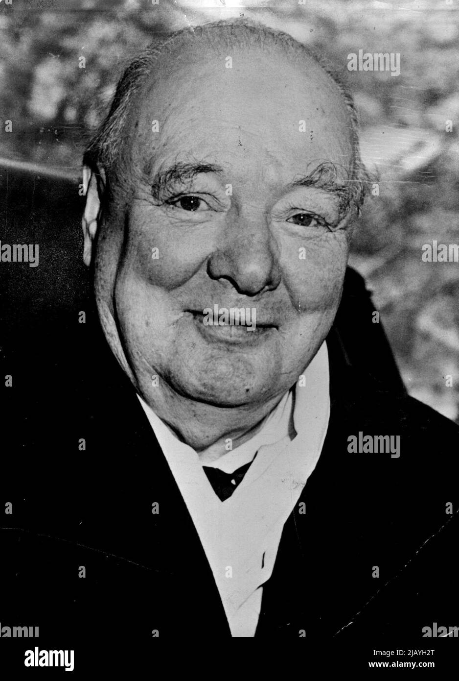 The Rt. Hon. Sir Winston Churchill, P.C., O.M., C.H.,M.P.: Churchill full face: The paternal smile of kindness and wisdom conceals the defiance and steely resolution that characterized the Churchill of World War II. - This photograph of Sir Winston was taken in January, 1953, during his visit to Washington. May 25, 1954. (Photo by Camera Press). Stock Photo