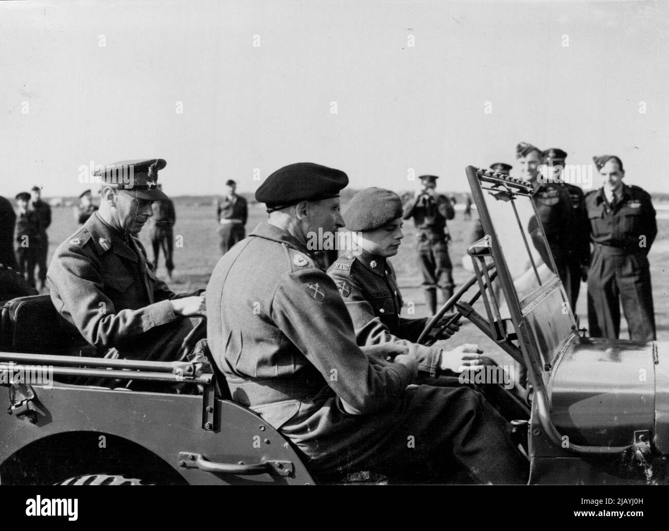 The King and Field Marshal leaving the aerodrome in a jeep. January 04, 1945. (Photo by PNA). Stock Photo