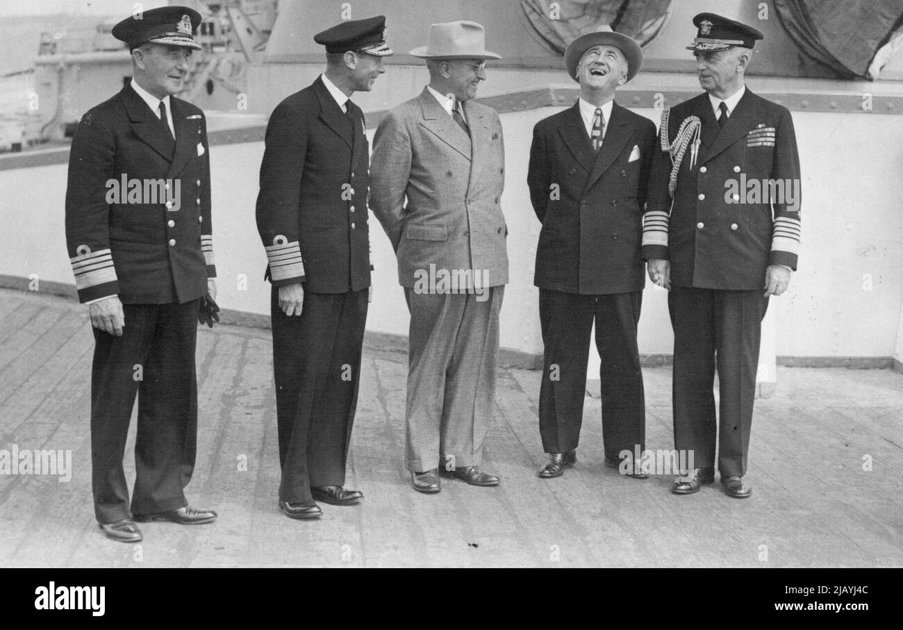 The King Receives President Truman At Plymouth Sound: Return Visit To American Warship -- Secretary of State James Byrnes is highly amused by a jovial remark from the President, who stands with His Majesty on the deck of the battle-cruiser H.M.S. Renown, on the left is Admiral Sir Ralph Leatham, C-in-C. Plymouth, and on the right Admiral Leahy, the President's Chief of Staff. The King received President Truman on board the battle-cruiser H.M.S. Renown in Plymouth Sound, after the President had flown to England from Potsdam. His Majesty then paid a visit to the U.S. cruiser Augusta, visiting th Stock Photo