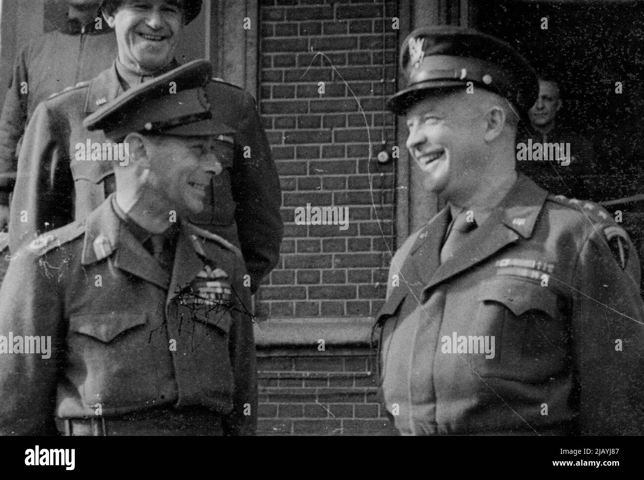 The King With Gen. Eisenhower At The Front: H.M. the King with General Dwight Eisenhower, during his Majesty's recent tour of the front in Belgium and Holland. March 12, 1945. (Photo by British Newspaper Pool Photo). Stock Photo