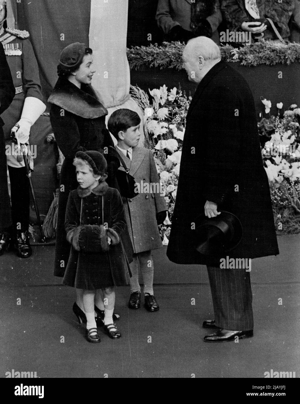 The Queen Mother Comes Home The Queen chats happily with Sir Winston Churchill as with Prince Charles and Princess Anne she awaits the arrival of the Queen mother at Waterloo. Queen Elizabeth the Queen mother arrived at Waterloo station this afternoon from Southampton after her visit to the United States and Canada. She was met at the station by Queen Elizabeth, the Duke of Edinburgh, Prince Charles and Princess Anne who accompanied her to Clarence house. In bright sunshine the royal party drove through cheering crowds in a carriage procession escorted by a Sovereign's escort of the household Stock Photo