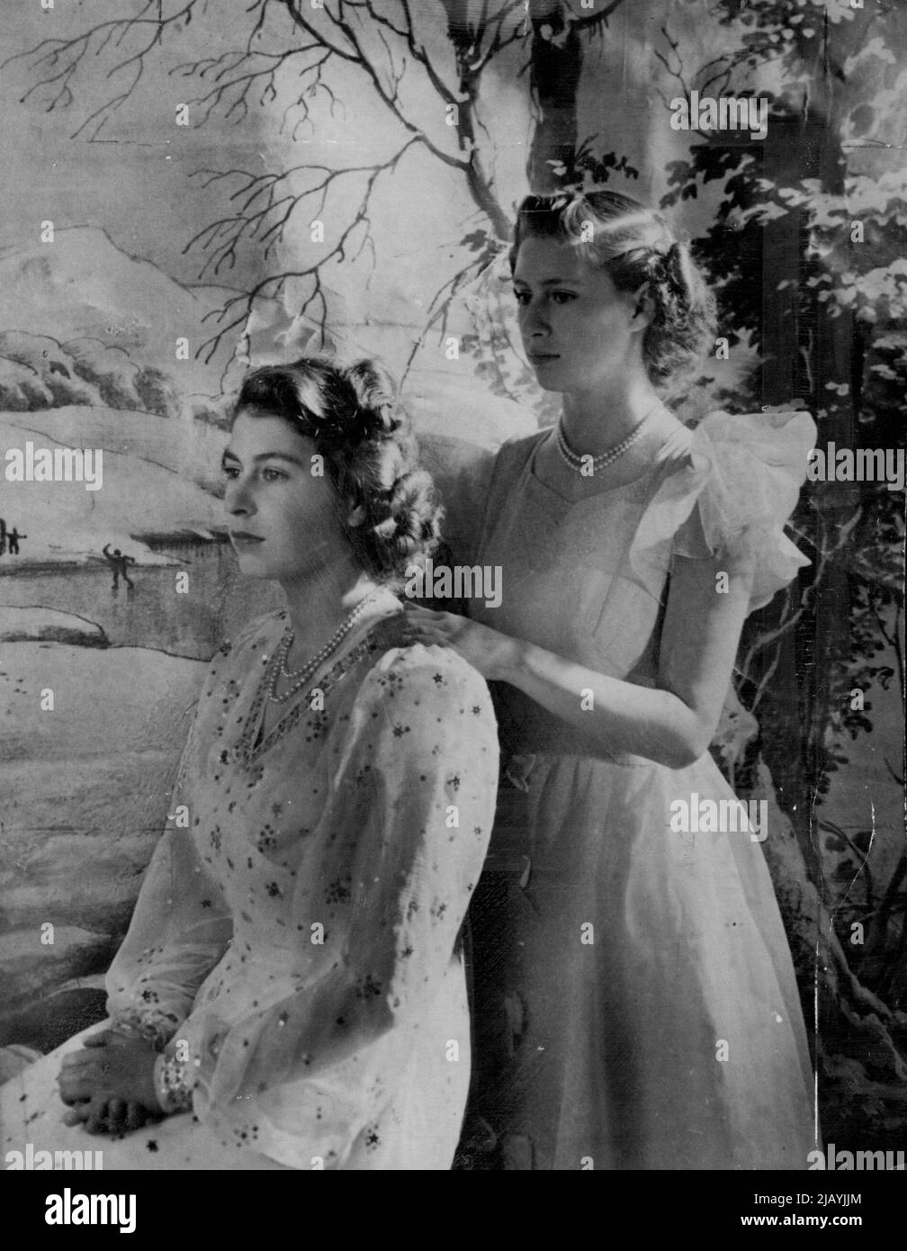 The Princess Pose -- Princess Margaret Rose (right) rests a hand on the  shoulder of her sister, Princess Elizabeth, in this new study of the  daughters of Kind George VI and Queen