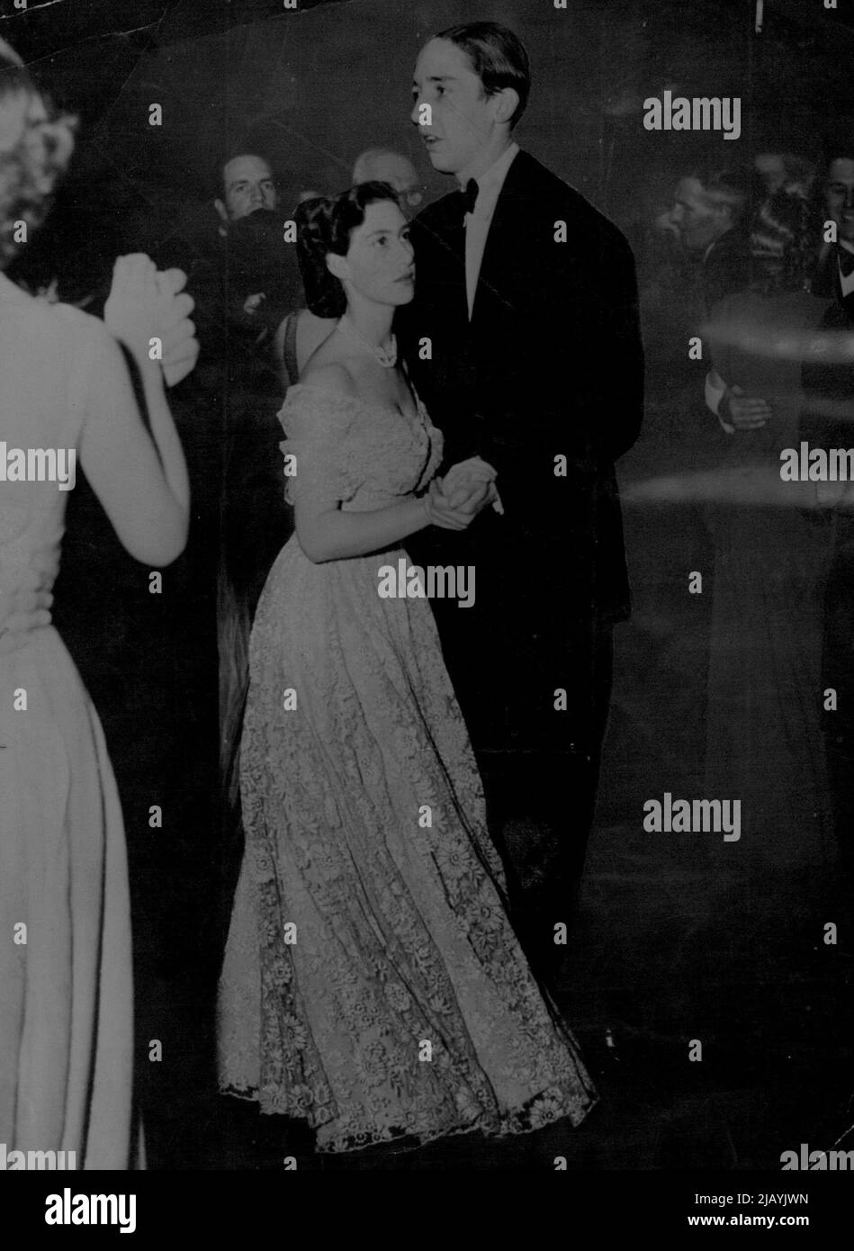 Princess Margaret dances the Samba ***** Dancing in 1948 with a lofty partner at a London ball. December 22, 1948. (Photo by The Associated Press Ltd.). Stock Photo