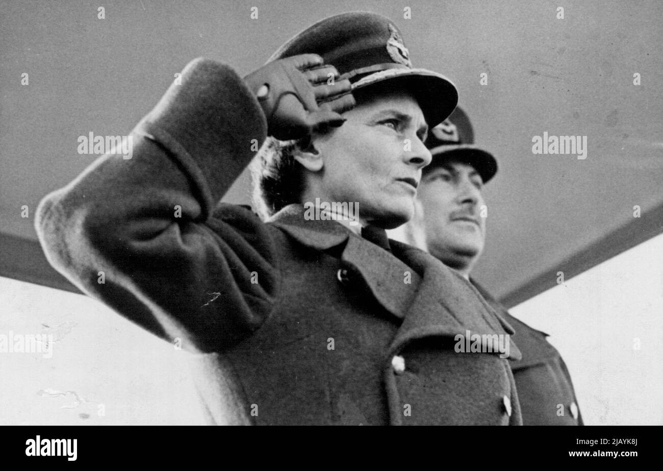 Visit from the chief. The Duchess of Gloucester, Air Chief Commandant of the Women's Royal Air Force takes the Salute during a march past at the RAF station at Medmenham, (Buck.) England. November 26, 1954. (Photo by Sport & General Press Agency Limited.) Stock Photo