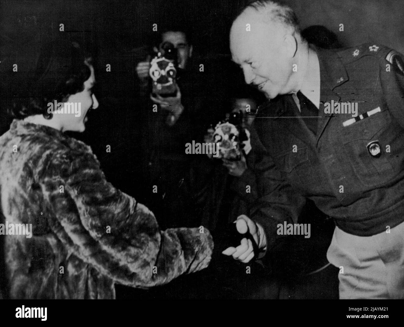 Princess Margaret At Shape -- Princess Margaret, on a four-day visit to Paris, is greeted by General Dwight D. Eisenhower on her arrival at his supreme headquarters, just outside Paris, today November 23. The Princess, who had tea with the General, arrived 20 minutes late because her driver took a wrong turning en route to shape. November 23, 1951. (Photo by Associated Press Photo). Stock Photo