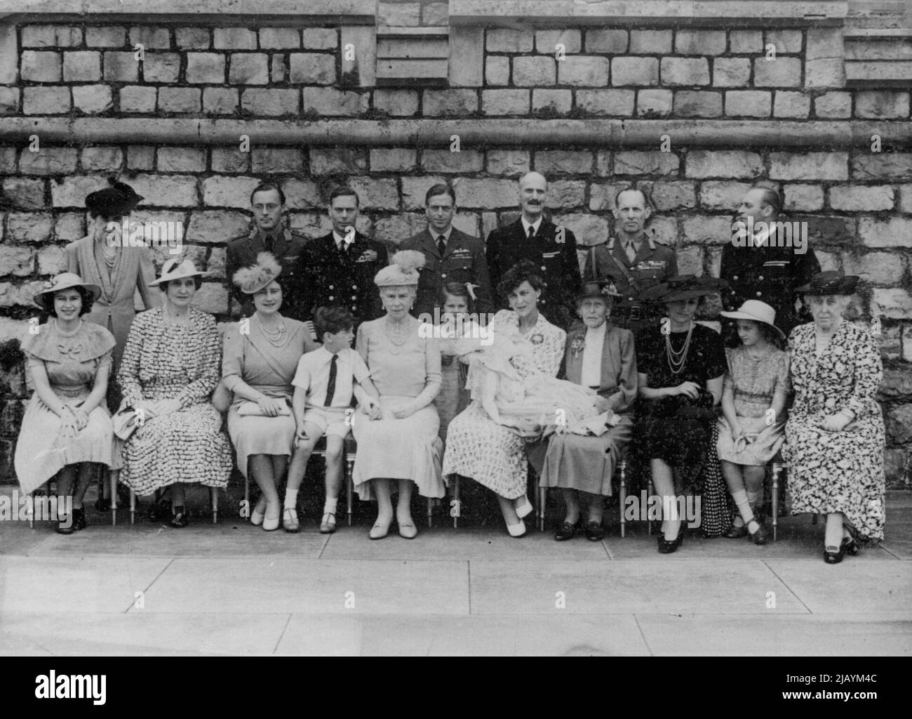 Christening Of The Duke And Duchess Of Kent's Baby. A photograph taken at the christening of the infant Prince George of Kent. Front row. Princess Elizabeth, Lady Patricia Ramsay, The Queen, Prince Edward, Queen Mary, Princess Alexandra, Duchess of Kent and the infant Prince, the Dowager Marchioness of Milford Haven, the Crown Princess Martha of Norway, Princess Margaret, and Princess Helena Victoria. Princess Marie Louise, Prince Bernhard of the Netherlands, the King, the Duke of Kent, King Haakon of Norway, King George of the Hellenes and Prince Olaf of Norway. August 05, 1942. (Photo by Spo Stock Photo